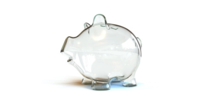Clear, empty piggy bank on white background